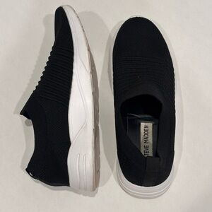 Steve Madden Woman’s Black Knit Slip-Ons